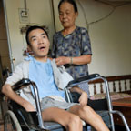 70-year old mother caring for 30-year old son disabled by Agent Orange